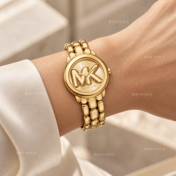 Gullfarget Michael Kors dameklokke med stor MK-logo og kraftig stållenke i 36mm